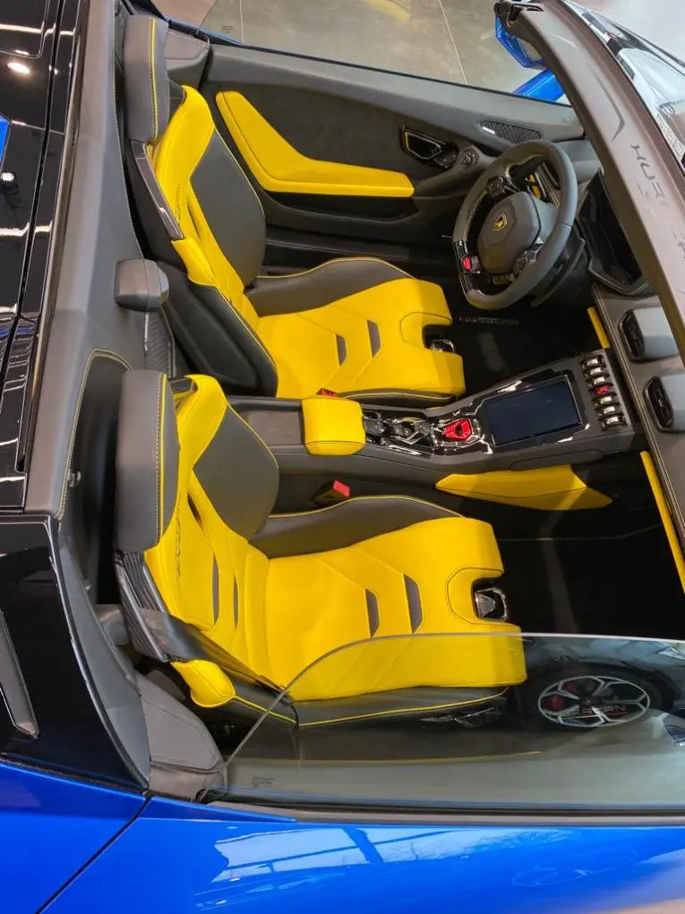 Lamborghini Huracan Evo Spyder 2022, exterior — Lisbon Luxury Car Rental, Lisbon. Open-top mornings along the Cascais coastal road